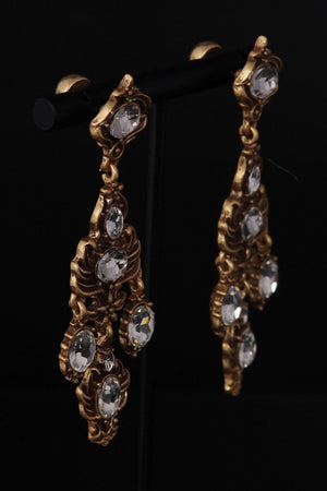 Front view of matching antique gold chandelier earrings with multiple clear oval crystals arranged in a symmetrical vintage-inspired design.