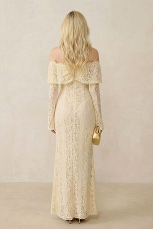 Back view of a buttercream lace off-shoulder maxi dress showing the smooth lace finish, long sleeves, and clean back silhouette with subtle structure.