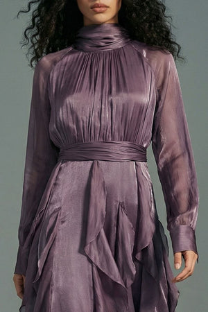 Close-up view of the plum satin maxi dress highlighting the gathered high neckline, subtle sheen of the fabric, defined waist wrap, and delicate ruffle construction.