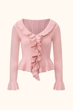 Front view of a pink ribbed knit sweater featuring a deep neckline, cascading ruffle trim, long sleeves, and a fitted silhouette, part of Sioéne’s feminine knitwear collection.