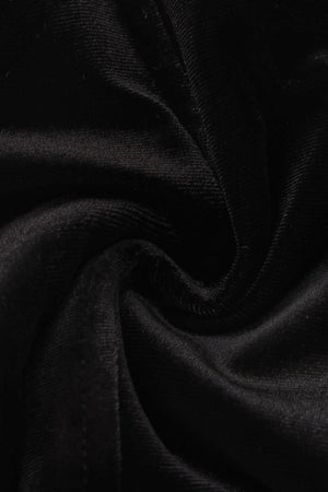 Close-up image of soft black velvet fabric showing its smooth, luxurious texture and subtle sheen, used for Sioéne’s velvet corset top.