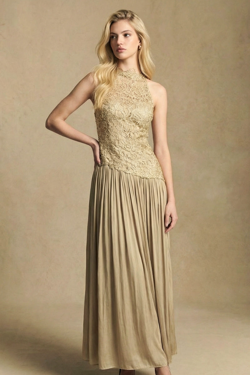 Model posing in a gold lace halter-neck midi dress, emphasizing the elegant side silhouette, fitted waist, and softly pleated skirt.