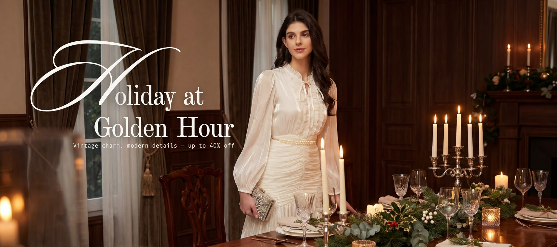 A woman wearing an elegant white long-sleeve evening dress standing beside a holiday dinner table decorated with candles and greenery in a warm wooden dining room, featured in Sioéne’s “Holiday at Golden Hour” campaign.