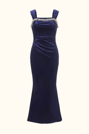 Elegant navy velvet maxi dress with wide straps and a crystal-embellished neckline, shown from the front against a neutral background.