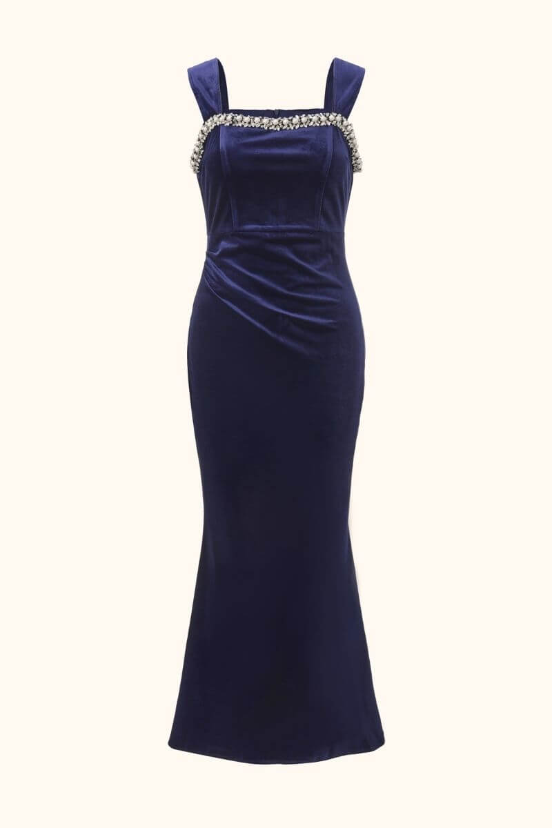 Elegant navy velvet maxi dress with wide straps and a crystal-embellished neckline, shown from the front against a neutral background.