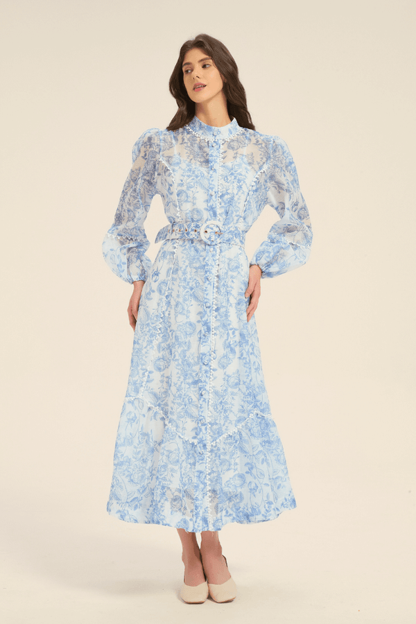 Front view of a blue floral belted midi dress featuring puff sleeves and button-down design.