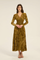 Front view of an olive green floral lace-trim maxi dress with long sleeves, buttoned waist, and flowing hem.